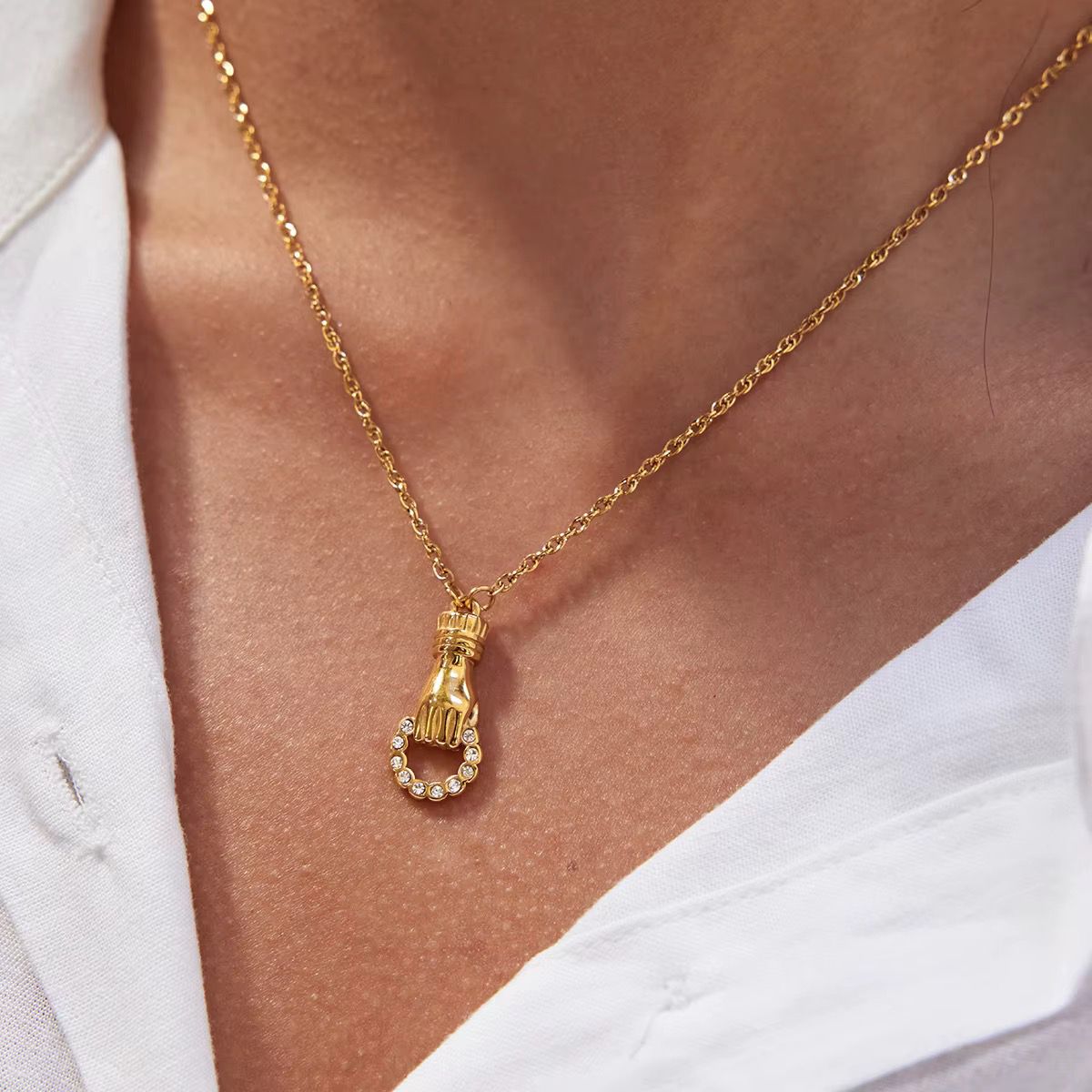 Elegant Golden Hand Pendant Necklace