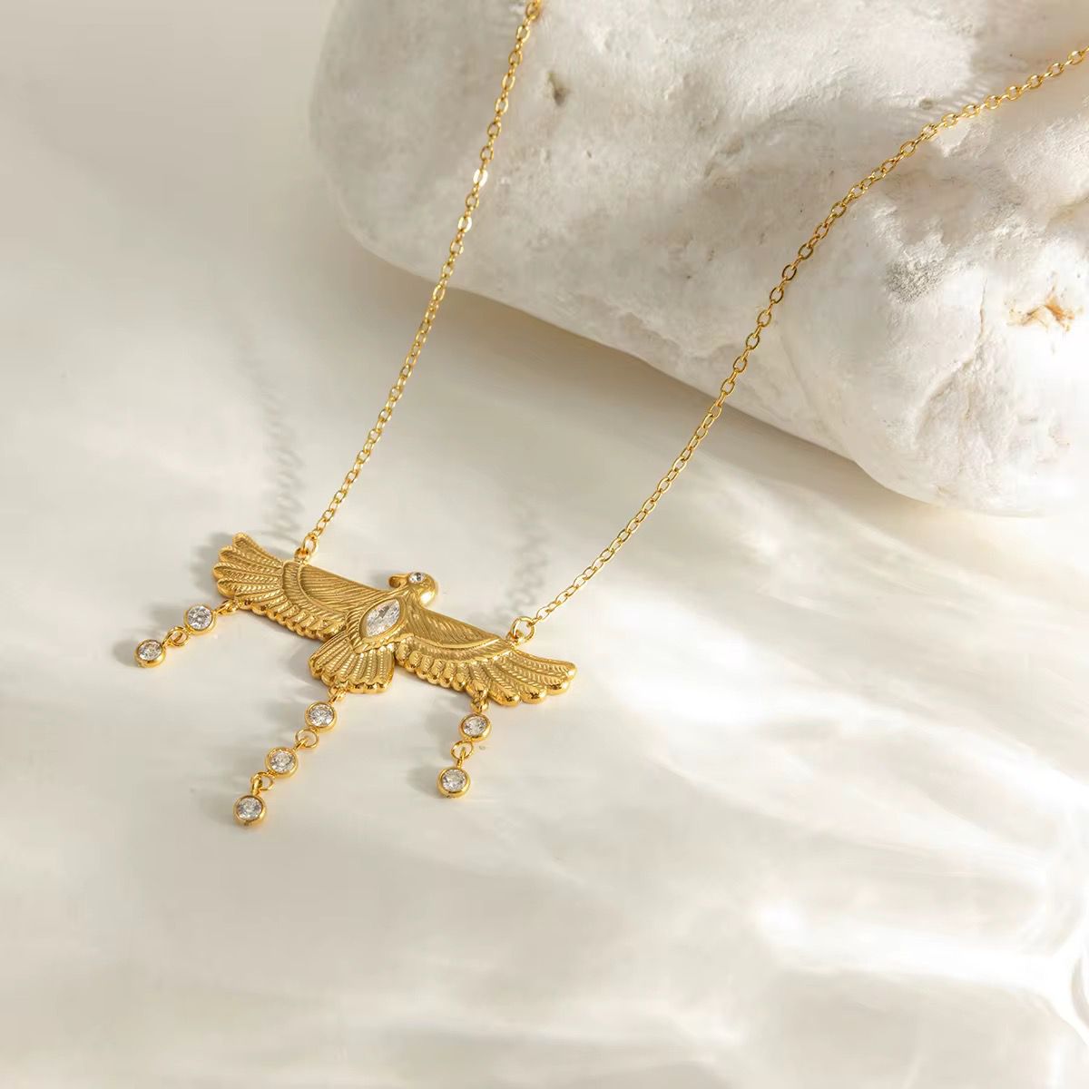 Radiant Eagle Pendant with Dangling Crystals